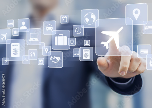 Business trip concept, businessman touching icons, travel plan