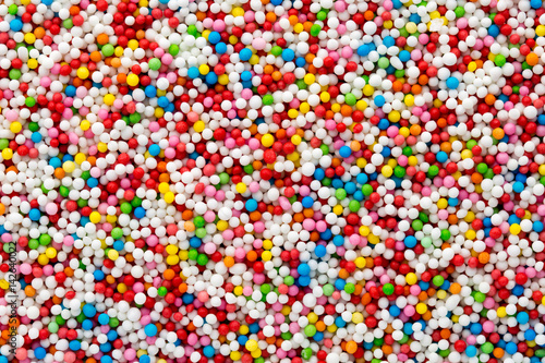 Multicoloured sweet sugar balls. Small ball pattern. © gitusik