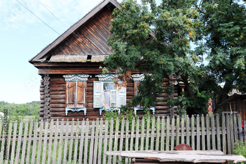 Very old wooden house in the remote Russian village in the summer