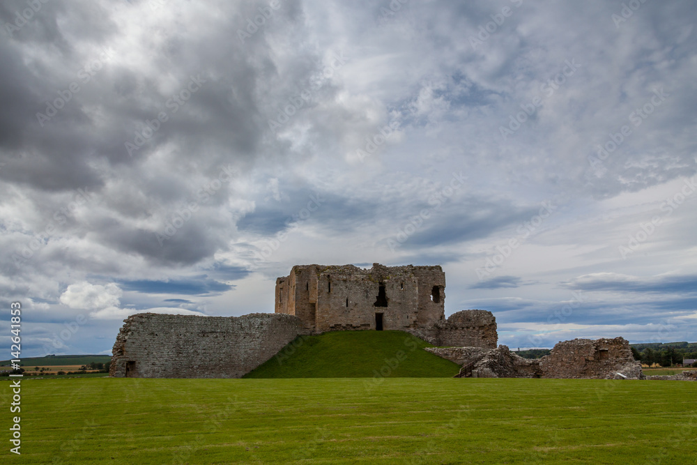 Duffus castle with cloudy sky