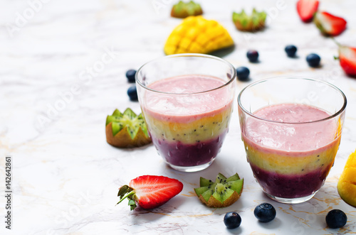 Blueberry mango strawberry kiwi banana greek yogurt smoothies
