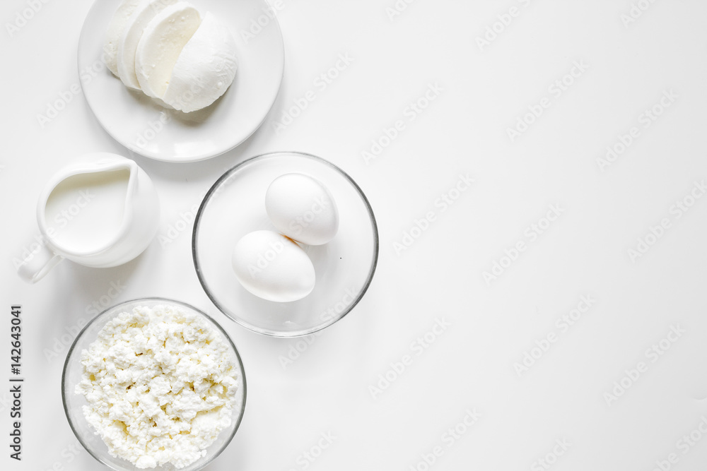 monochrome concept with dairy products on white table top view mockup monochrome concept with dairy products on white table top view mockup