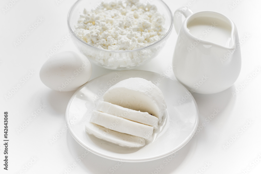 Fototapeta premium Fresh dairy products on white desk background