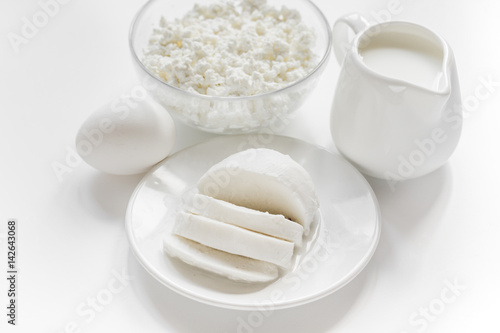 Fresh dairy products on white desk background