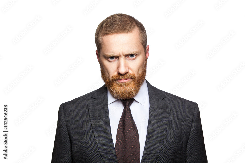 Unhappy sad businessman looking at camera. isolated on white, looking at camera.. Unhappy sad businessman looking at camera. isolated on white, looking at camera..