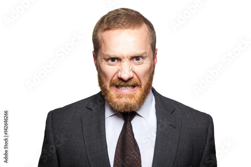 Angry crazy businessman looking at camera. isolated on white, looking at camera..