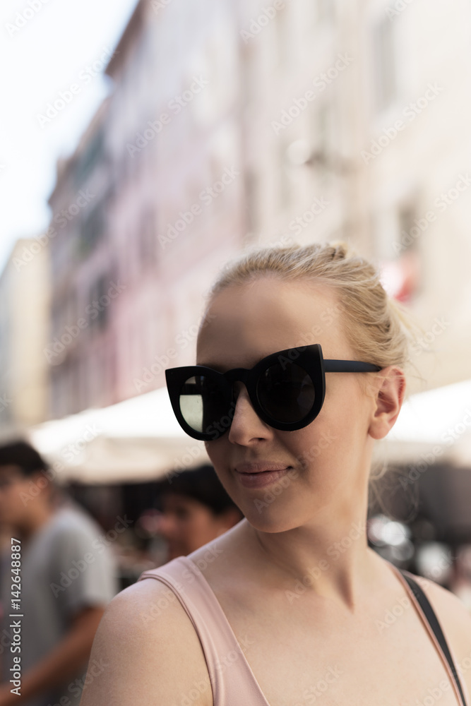 Portrait of a beautiful young girl on a street. Portrait of a beautiful young girl on a street.