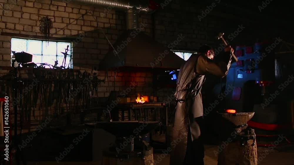Incandescent element in the smithy on the iron anvil Incandescent element in the smithy on the iron anvil