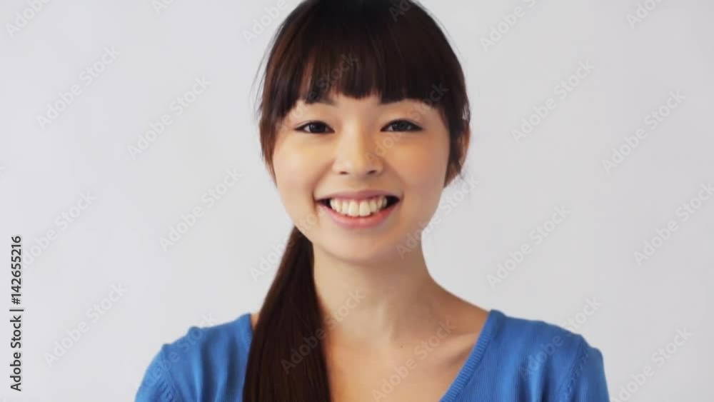 happy smiling asian young woman happy smiling asian young woman