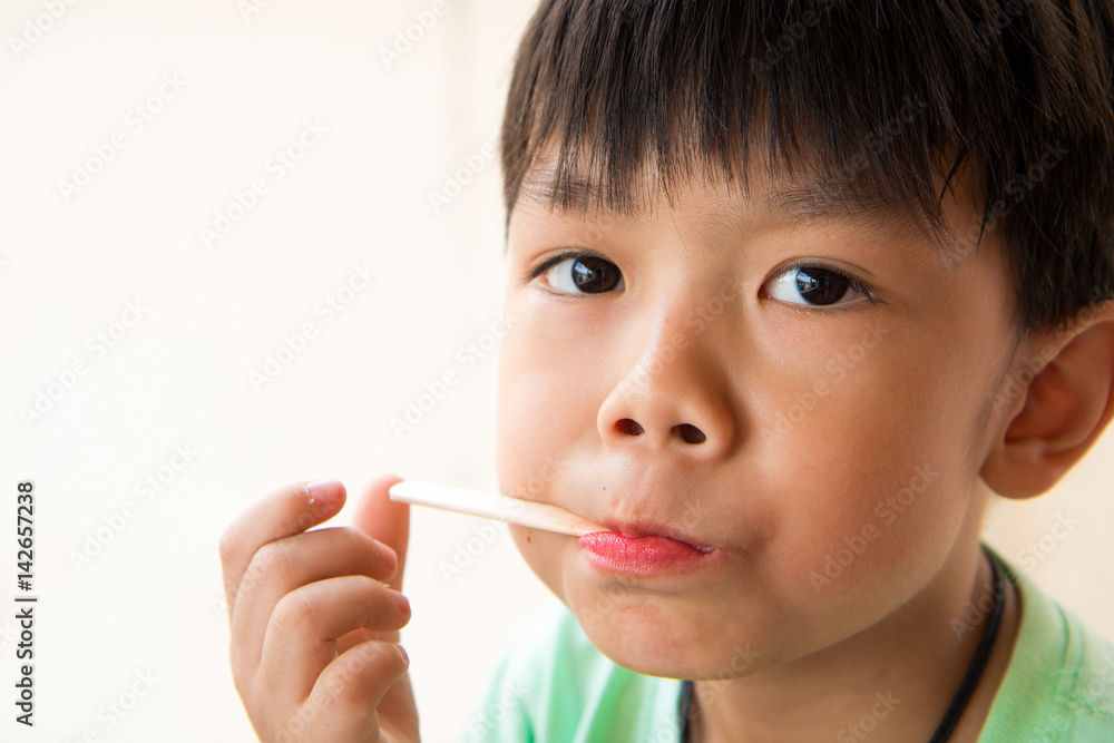 boy has satisfied when he eat favorite ice cream boy has satisfied when he eat favorite ice cream