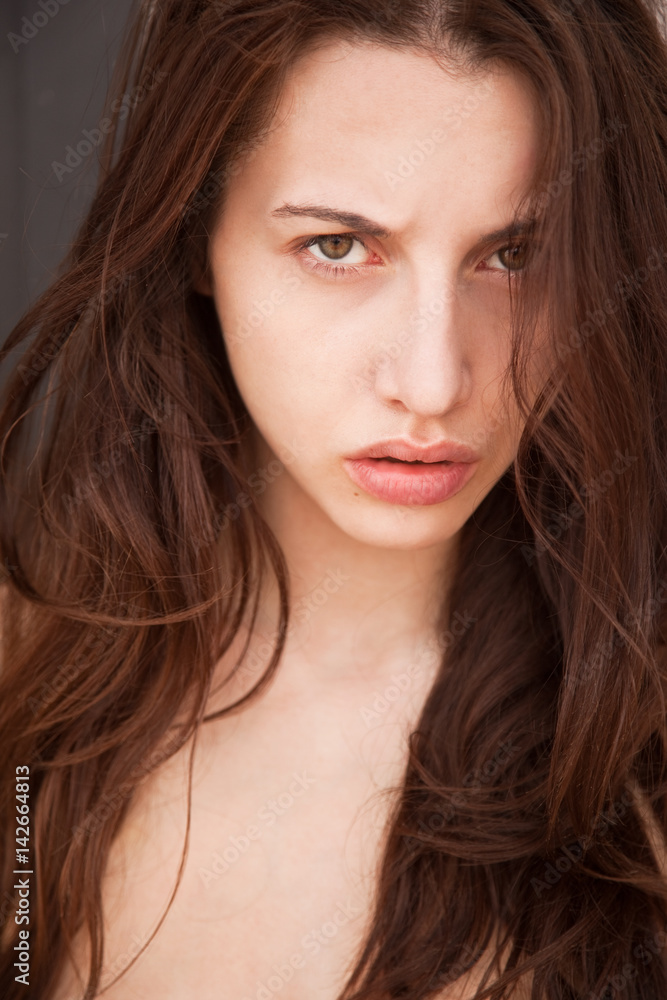 Woman with a deep piercing eyes Woman with a deep piercing eyes
