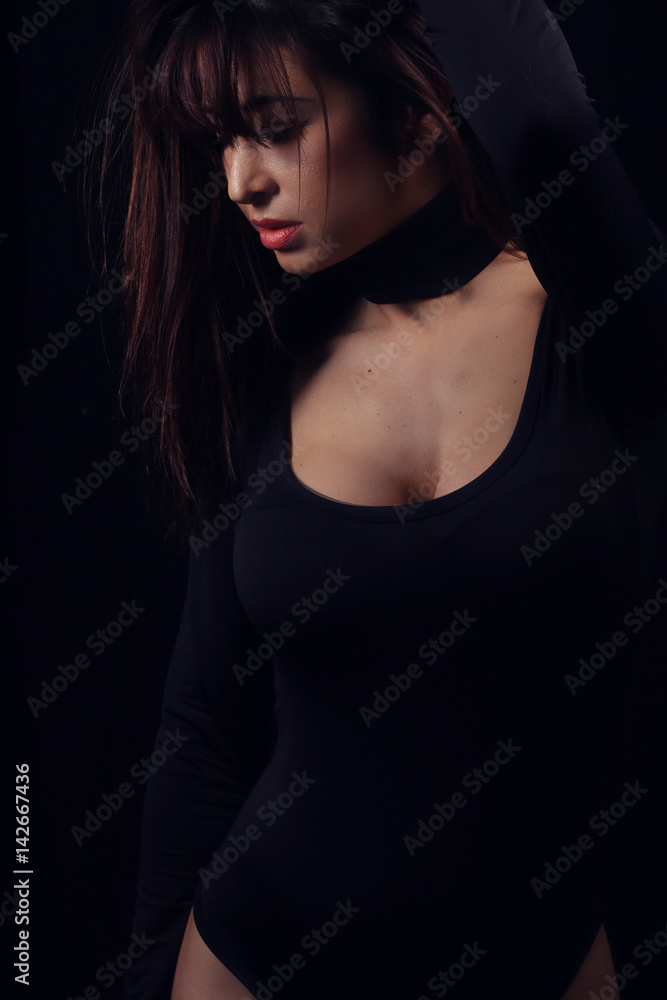 Beautiful woman wearing a black bodysuit Beautiful woman wearing a black bodysuit