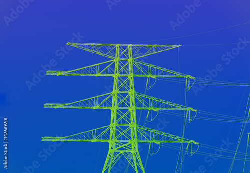 High voltage tower in the night background.