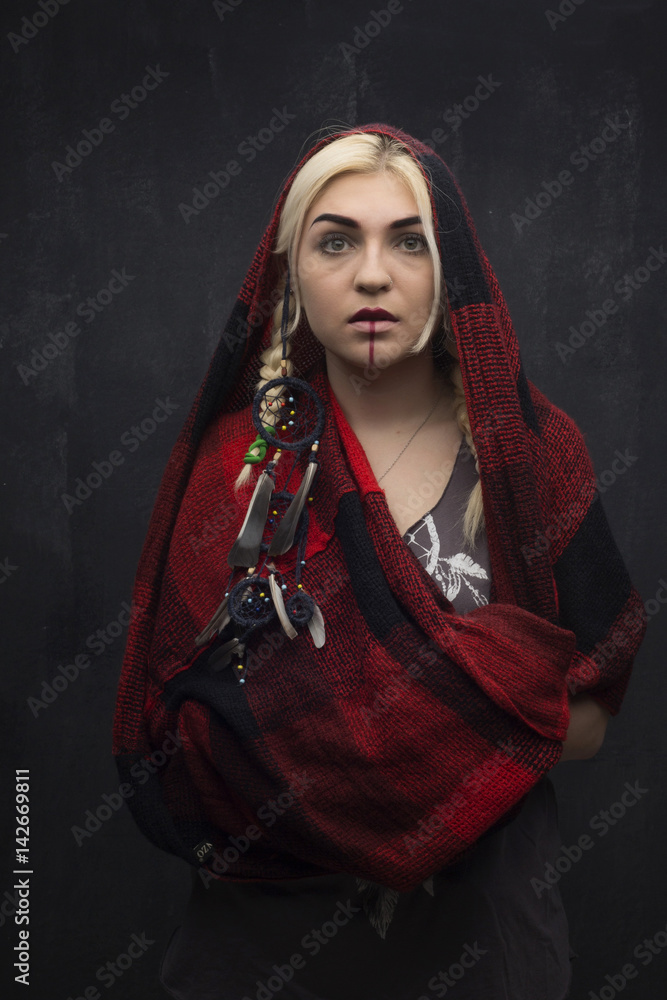 A girl dressed as an American Indian A girl dressed as an American Indian