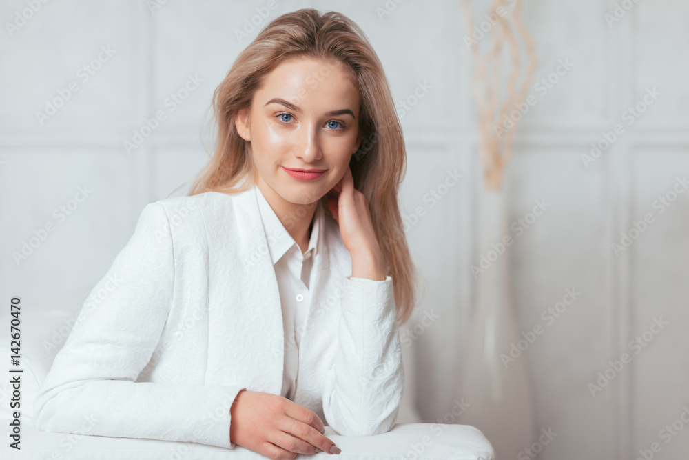 Portrait of beautiful young woman working in the office. Portrait of beautiful young woman working in the office.