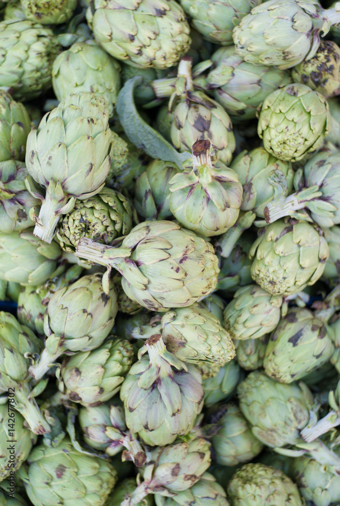 Fine artichokes at market stall Fine artichokes at market stall
