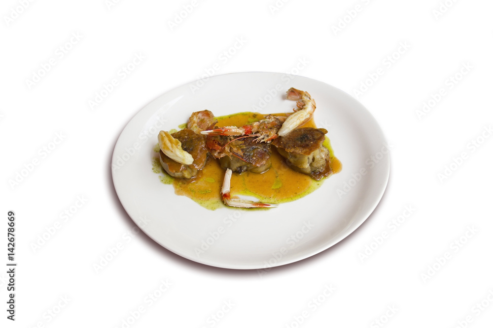 Plate of garnished monkfish Plate of garnished monkfish