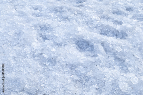 Broken crushed ice winter snow background