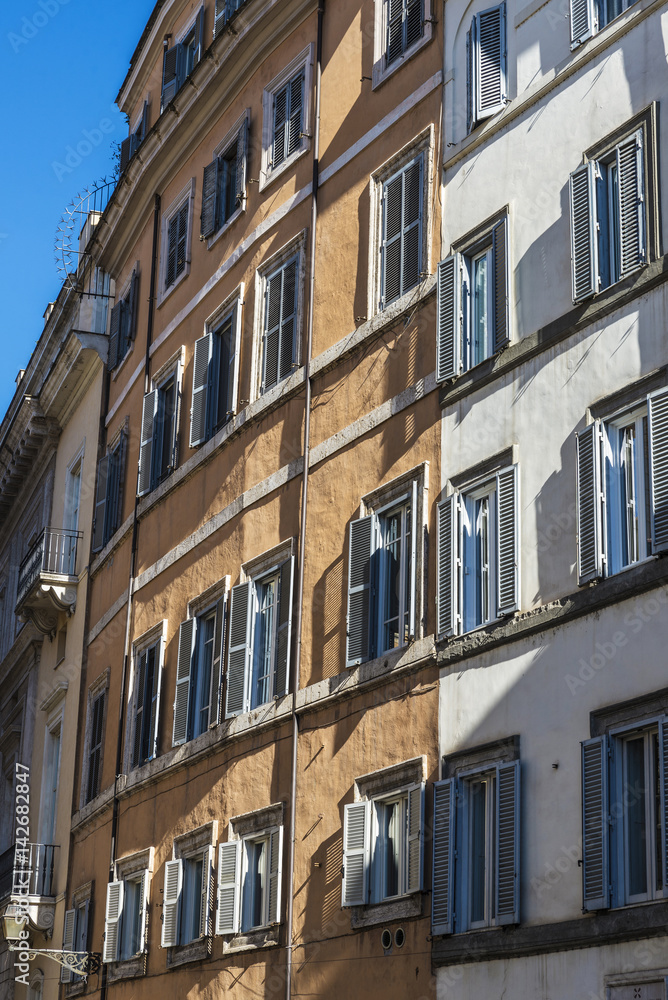 Facade of an old classic building in Rome, Italy
