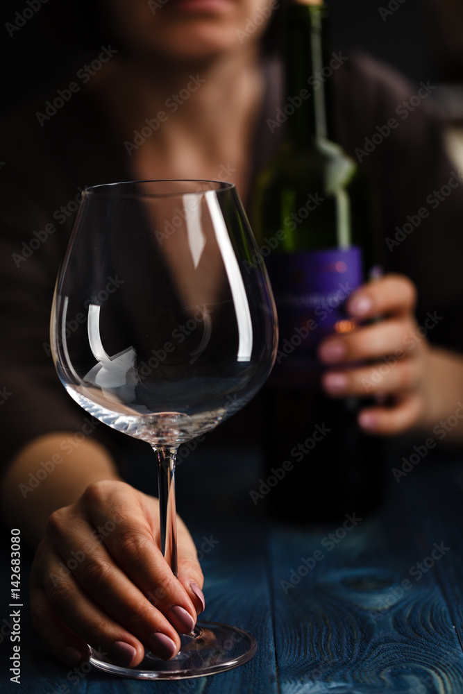 Drunk female with bottle of alcohol. Soccial issue alcoholism. Drunk female with bottle of alcohol. Soccial issue alcoholism.