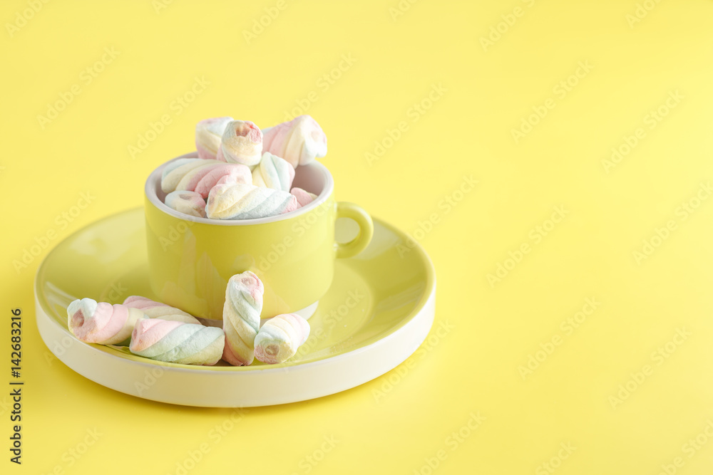 Twisted marshmallow on vibrant background, top view Twisted marshmallow on vibrant background, top view