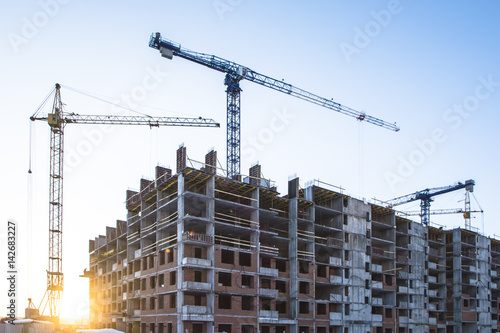 Panorama of construction at the background of blue sky