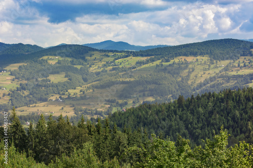 Panoramic view over Carpathian Mountains , Romania in a  beautiful summer day © FotoGroupMedia