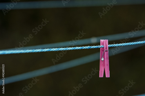 Clothes pin isolated on rope