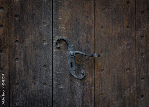 The old vintage door handle and keyhole