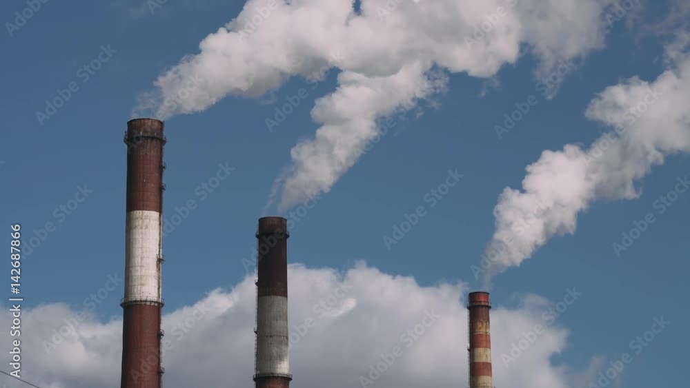 CHP Industrial landscape, smoke comes from pipes. 4k footage.
CHP Industrial landscape, smoke comes from pipes. 4k footage.