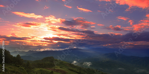 Majestic sunset in the mountains landscape. © Pheniti