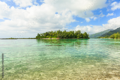 The Beautiful sea and small Island near Moorae Island at Tahiti PAPEETE, FRENCH POLYNESIA. © sarayuth3390
