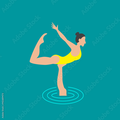 Woman athlete on the performance of synchronized swimming performing art elements