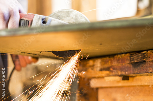 Sparks from a grinder to cut metal