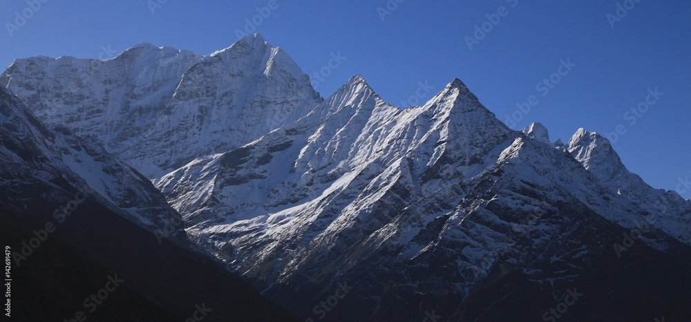 Khusum Khangaru and other high mountains in the Everest National Park. View from Namche Bazar.