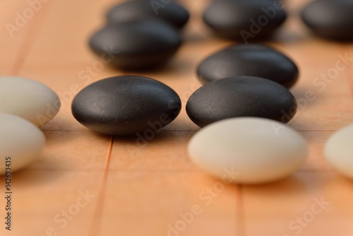 GO game. GO is an abstract strategy board game for two players  in which the aim is to surround more territory than the opponent.