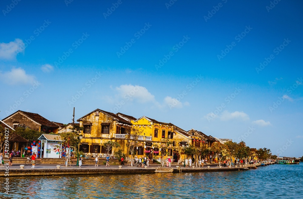 HOI AN, VIETNAM - MARCH 15, 2017: Ancient street view on a nice day