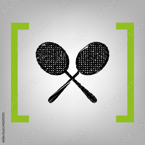 Tennis racquets sign. Vector. Black scribble icon in citron brackets on grayish background.