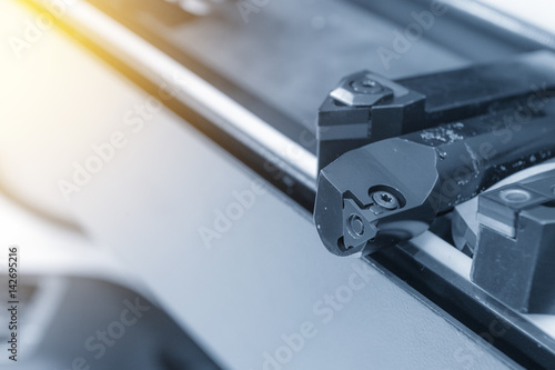 Wallpaper Mural The lathe tool for CNC lathe machine in the light blue with lighting effect Torontodigital.ca