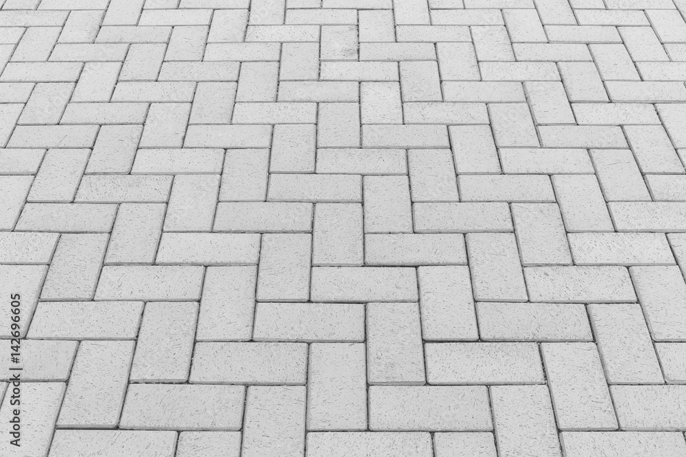 Paver brick floor also call brick paving, paving stone or block paving. Manufactured from concrete or stone for road, path, driveway and patio. Empty floor in perspective view for texture background. Paver brick floor also call brick paving, paving stone or block paving. Manufactured from concrete or stone for road, path, driveway and patio. Empty floor in perspective view for texture background.