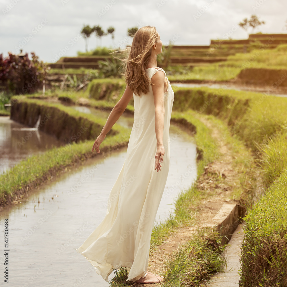 Beautiful woman in white dress. Rice terraces. Beautiful woman in white dress. Rice terraces.