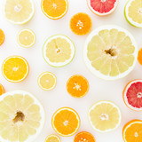 Lemon, orange, mandarin, grapefruit and sweetie on white background. Flat lay, top view.
