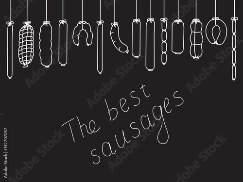 A set of sausage on a black background. Hand-written text, scribble