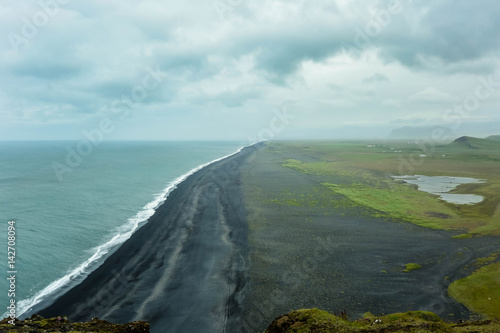 Black beach in Iceland. Dyrhalaey.