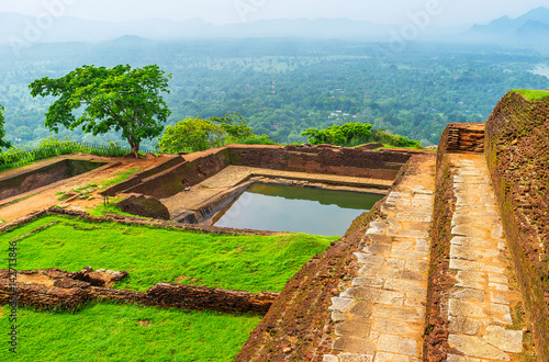 The top of Sigiriya Rock is the interesting place to discover the ancient ruins and overlook the landscapes, located around the Rock, Sri Lanka. photo