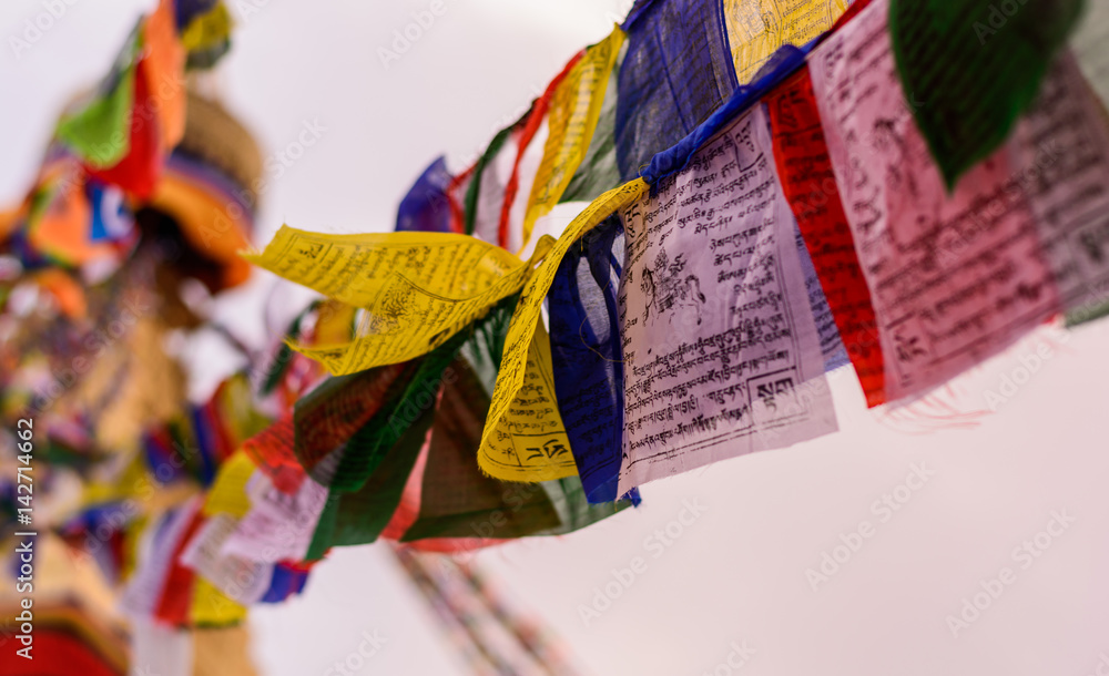 blurred backgound of flying flags in Baudhanath stupa in Kathmandu Nepal with some copy space blurred backgound of flying flags in Baudhanath stupa in Kathmandu Nepal with some copy space