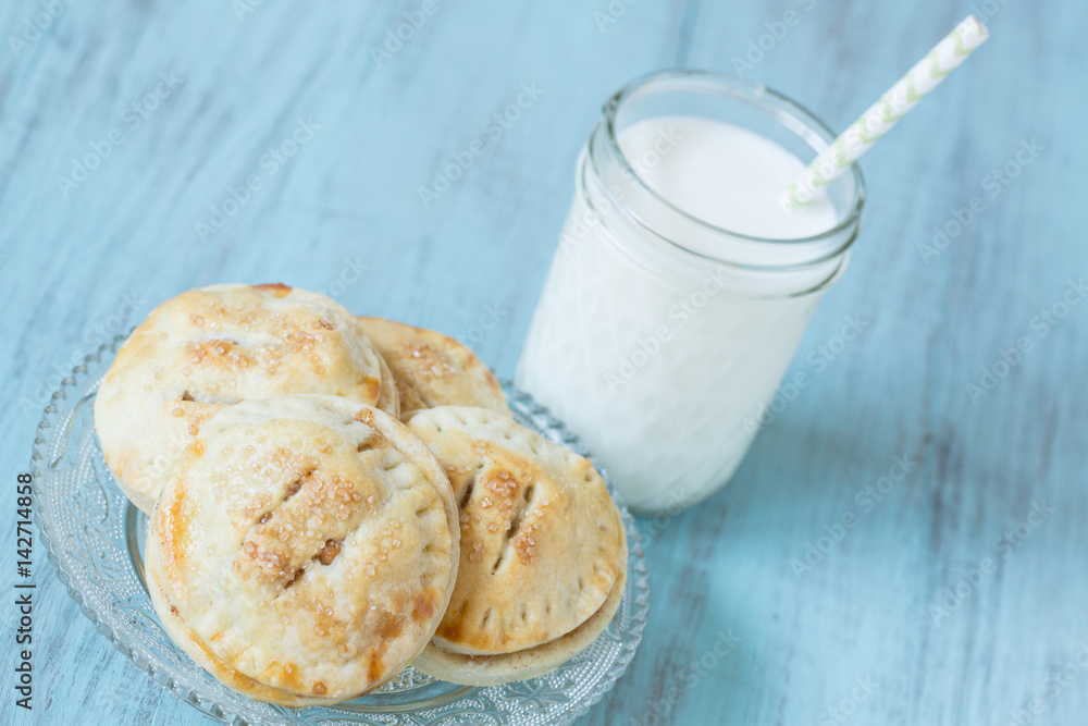 Close Up Small Apple Hand Pies With Milk Close Up Small Apple Hand Pies With Milk