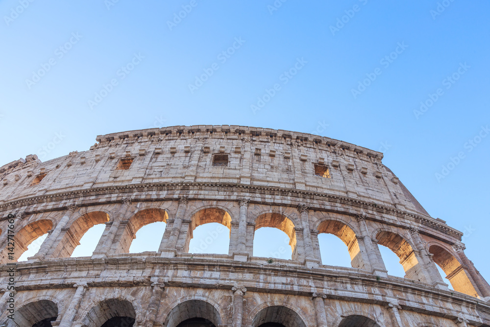 Italy, Rome, a fragment of the wall of the Colosseum. Windows, set, sun