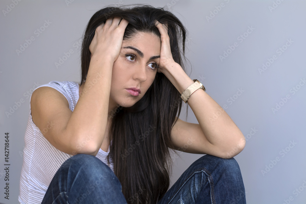 sad worried woman in thoughts at home sad worried woman in thoughts at home