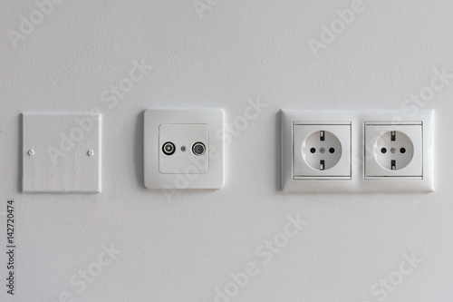 white sockets on a white wall